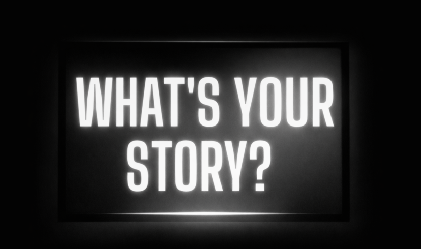 Bold illuminated text asking “What’s your story?” representing brand storytelling and content strategy in digital media marketing